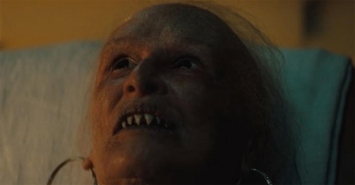 Glenn Close with sharp teeth and no hair in 'The Deliverance.' 