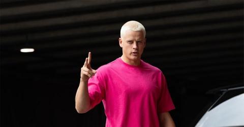 Joe Burrow in a pink t-shirt with his new haircut.