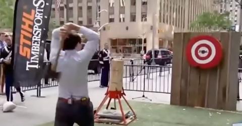 Pete Hegseth throwing an axe.