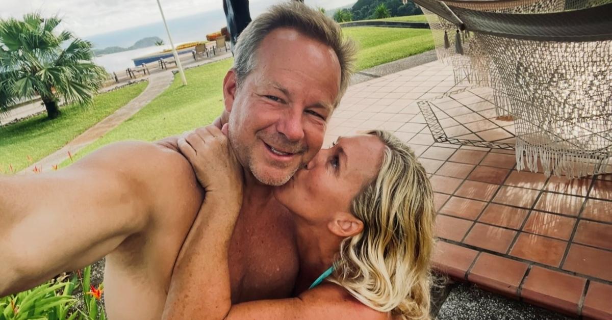Marjorie Taylor Greene kisses Brian Glenn near a beach.