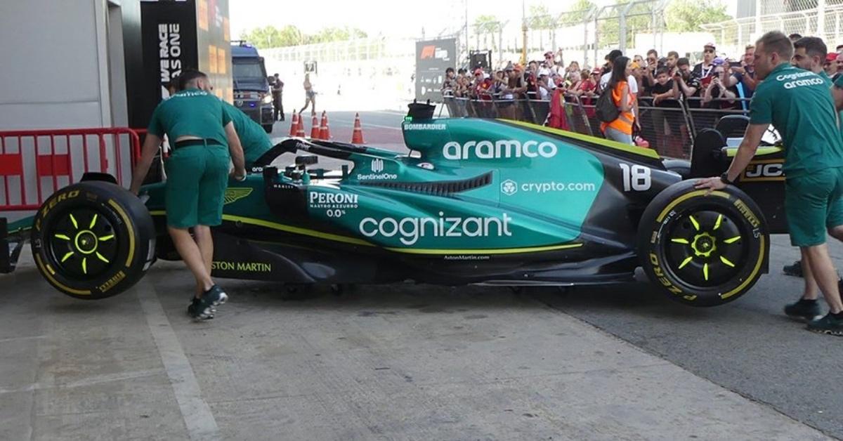 The new green Aston Martin racing car (AMR22) at practice.