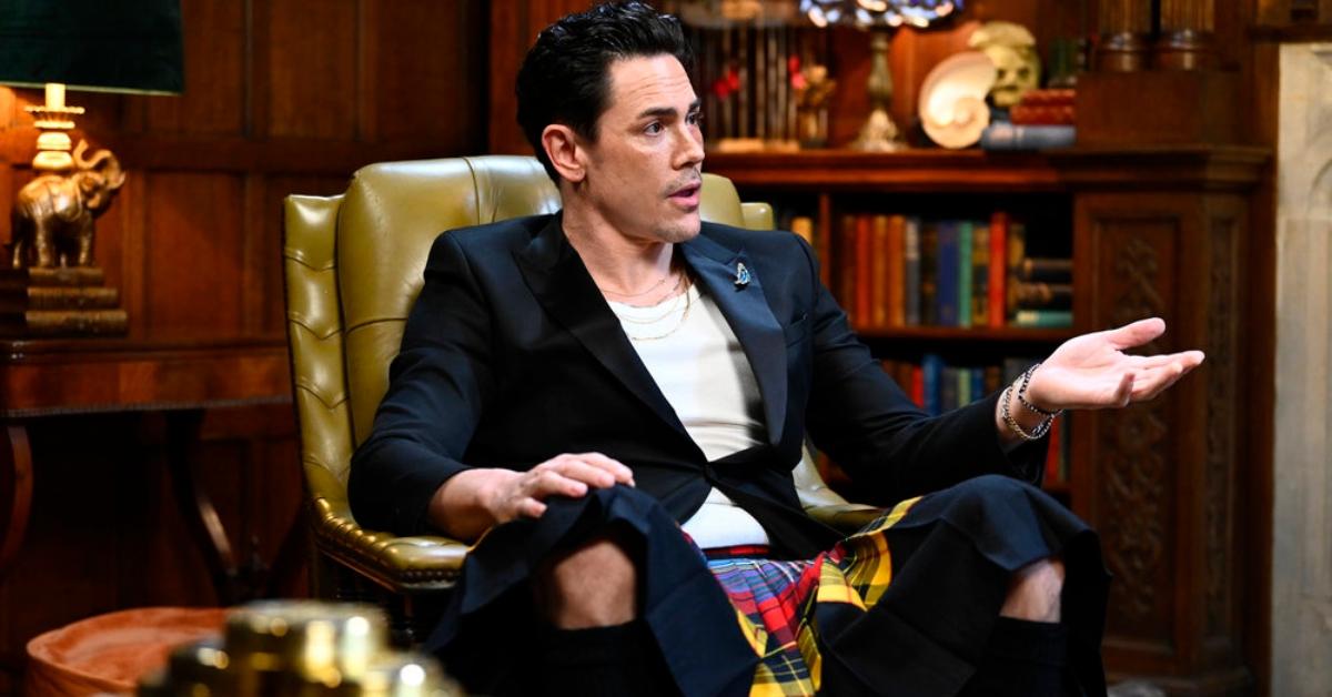 Tom Sandoval sits in an armchair on The Traitors