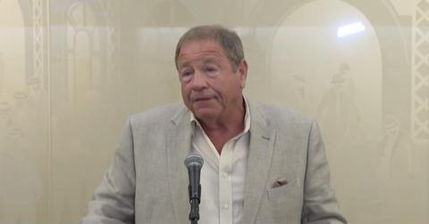 Stan Savran speaking into a microphone.