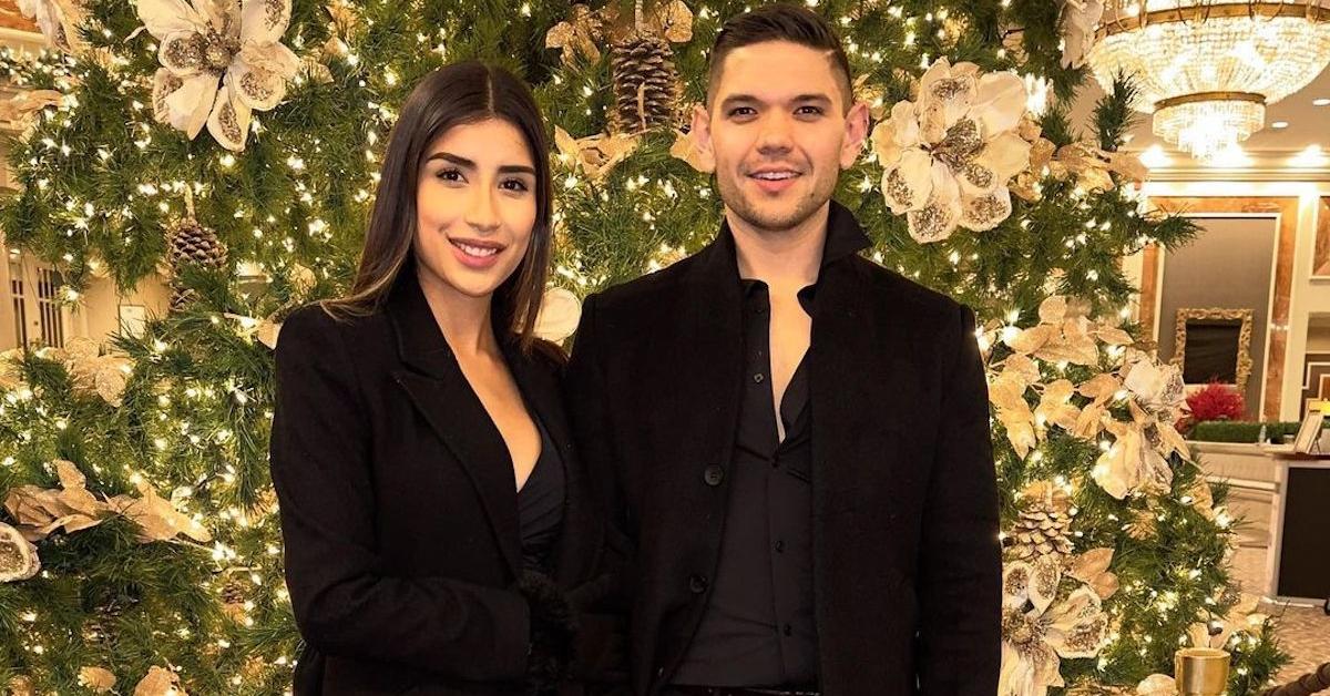 Tania Deleanos and Kyle Abrams posing together during the Christmas holiday