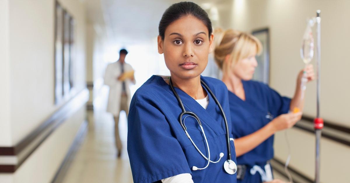 A nurse in a hospital hallway