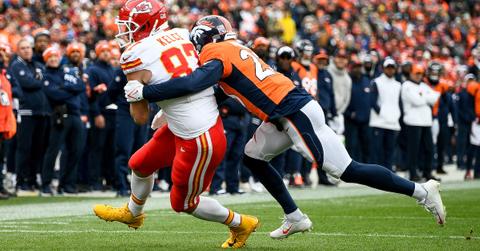 Travis Kelce wearing yellow shoes