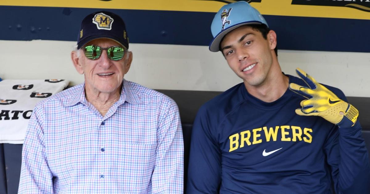 Christian Yelich sitting with a legend.