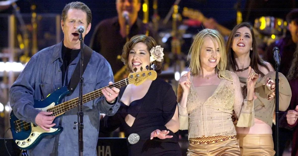 Brian Wilson on stage with his daughters Carnie and Wendy, who are part of Wilson Phillips