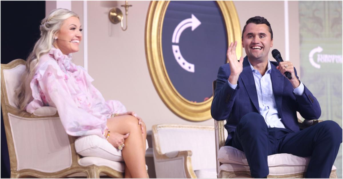 Erika Kirk and her husband Charlie giving a speech