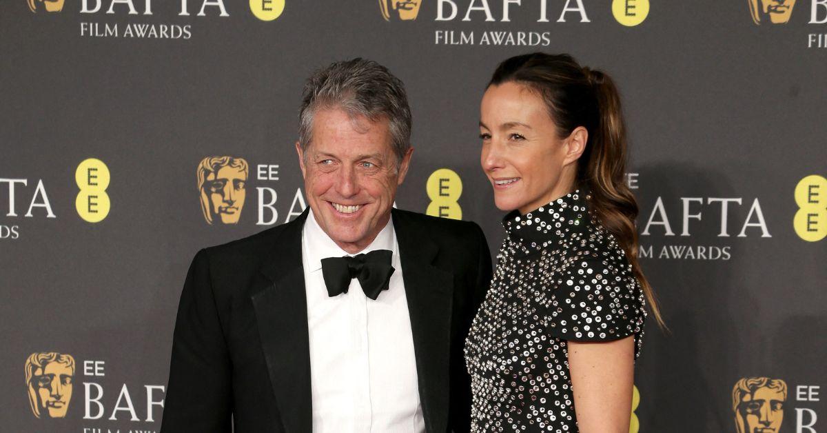 Hugh Grant and Anna Eberstein at the 2025 BAFTA Awards.