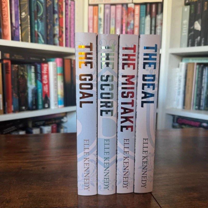  The 'Off Campus' book series sitting on a desk.