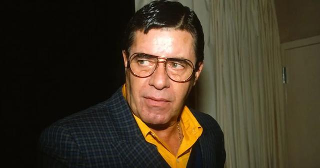 Jerry Lewis leaving a press conference on Oct. 16, 1986