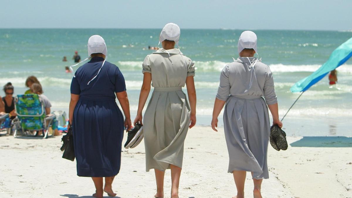 Rosanna Miller, Ada Byler and Maureen Byler on the beach. 