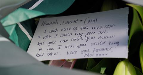 A handwritten card placed outside of John Hunt's home