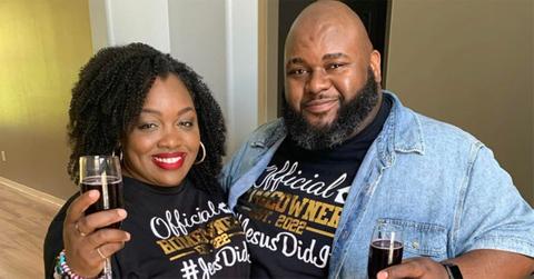 C. Ashley Brown-Lawrence holding wine with her husband.