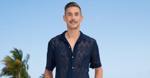 Julian Foster wearing a navy shirt