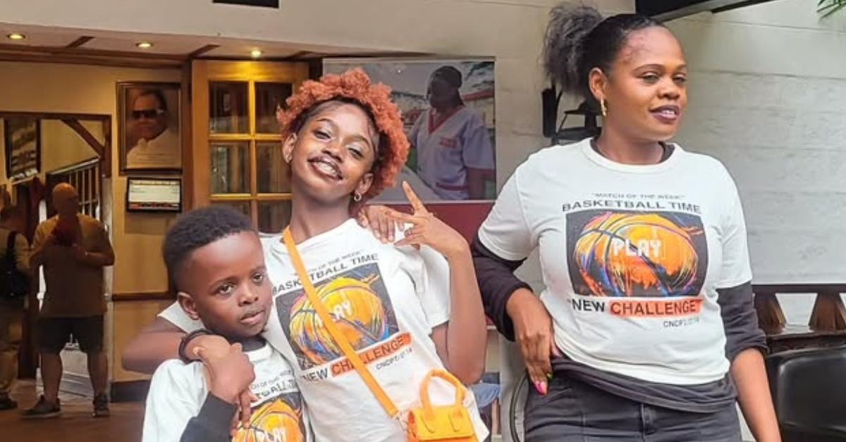 (l-r): Betty Bayo's son, her daughter, and Betty Bayo