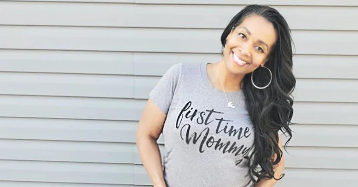 Shea Hicks Whitfield wears a t-shirt with the words "first-time mom"