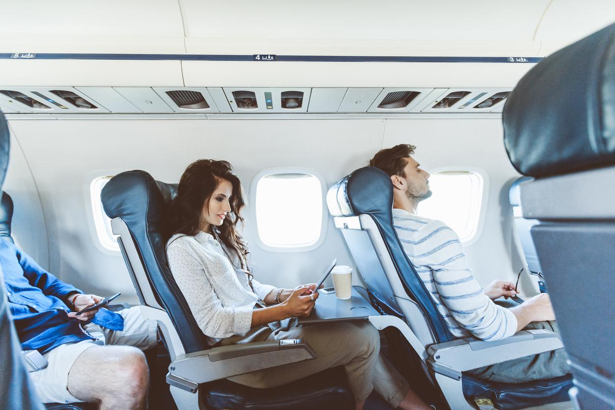 women stop creepy man on airplane