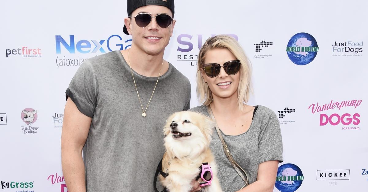 Tom Sandoval (L) and Ariana Madix and their dog Charlotte attend the Lisa Vanderpump and The Vanderpump Dog Foundation's 3rd Annual World Dog Day at West Hollywood Park on May 19, 2018 in West Hollywood, California.