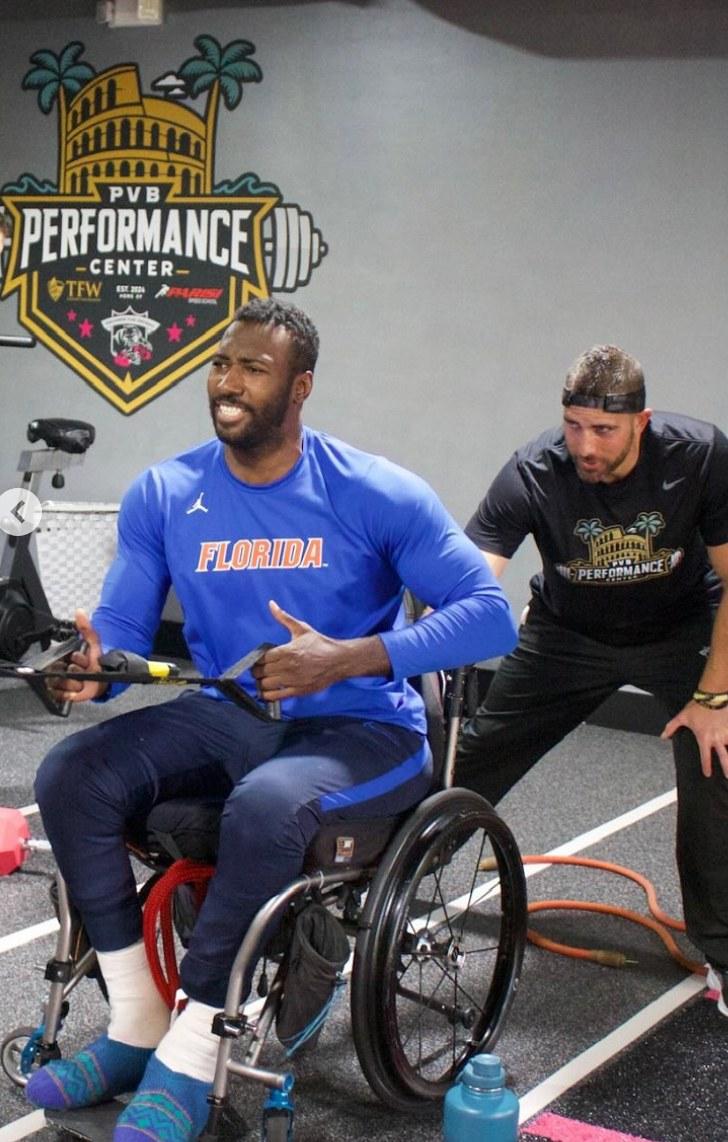 Patric Young in a wheelchair participating in a sporting event.