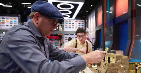 Ben and Poppy building with LEGOs.