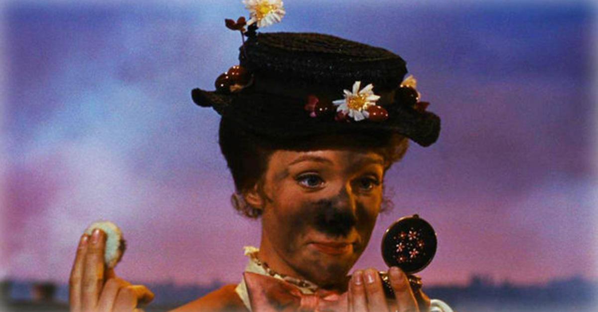 Mary Poppins covered in soot and looking in a mirror. 