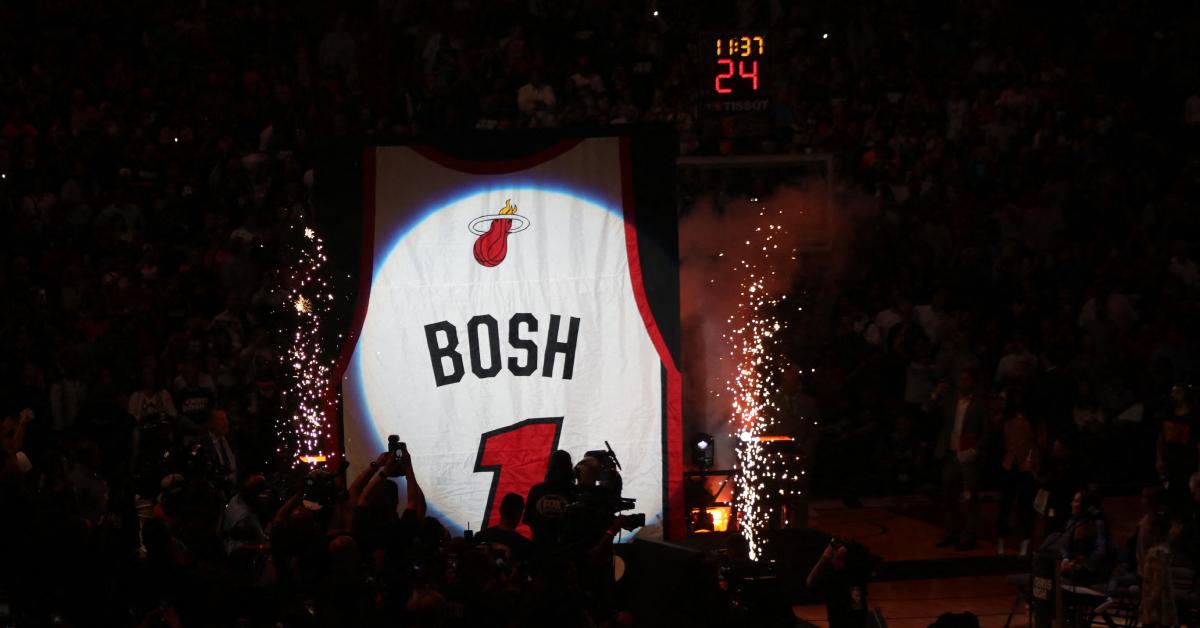 The Miami eat raise Chris Bosh's No. 1 jersey to the rafters on March 26, 2019.