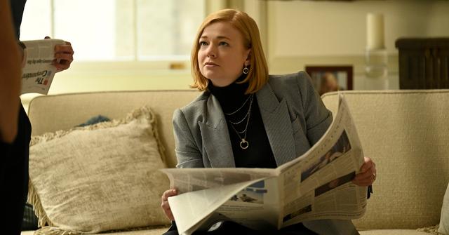 Shiv reading a newspaper in 'Succession' Season 4