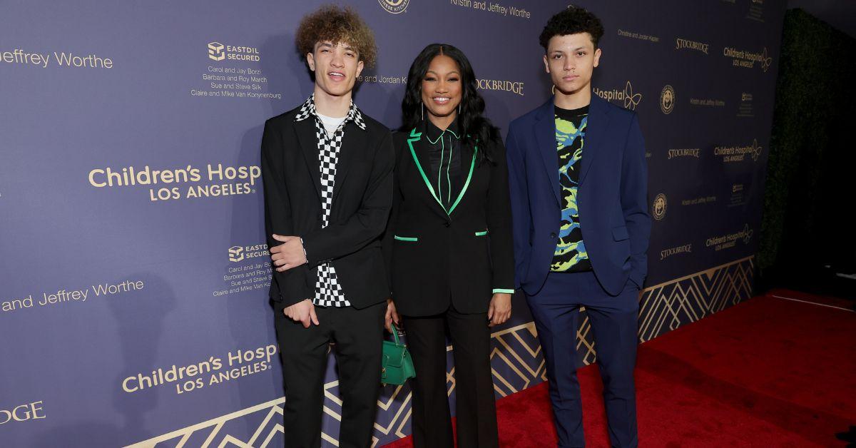 (l-r): Jaid Nilon, Garcelle Beauvais, and Jax Nilon attending a red carpet event.