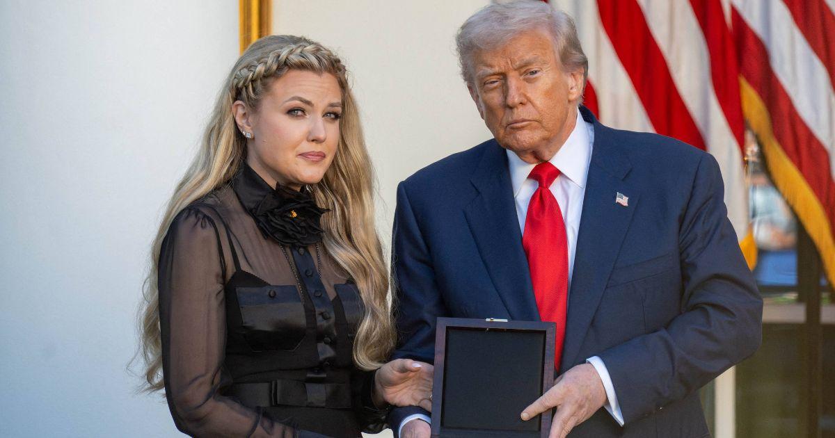 Erika Kirk accepts the Medal of Freedom on behalf of her husband, Charlie Kirk, who was posthumously awarded by President Donald Trump