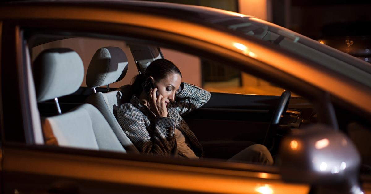 woman on phone in car