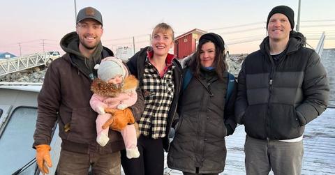 Emily Riedel, Alex Trokey, baby Evelyn, and the crew of 'Bering Sea Gold'