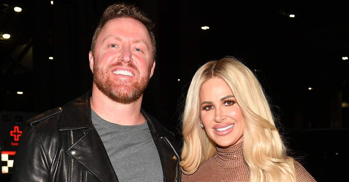Kroy Biermann and Kim Zolciak-Biermann are seen arriving outside the Post Malone concert at State Farm Arena on October 18, 2022 in Atlanta, Georgia. 