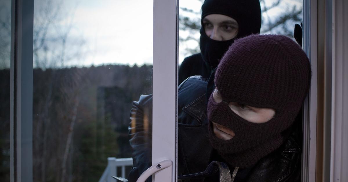 Two burglars entering home