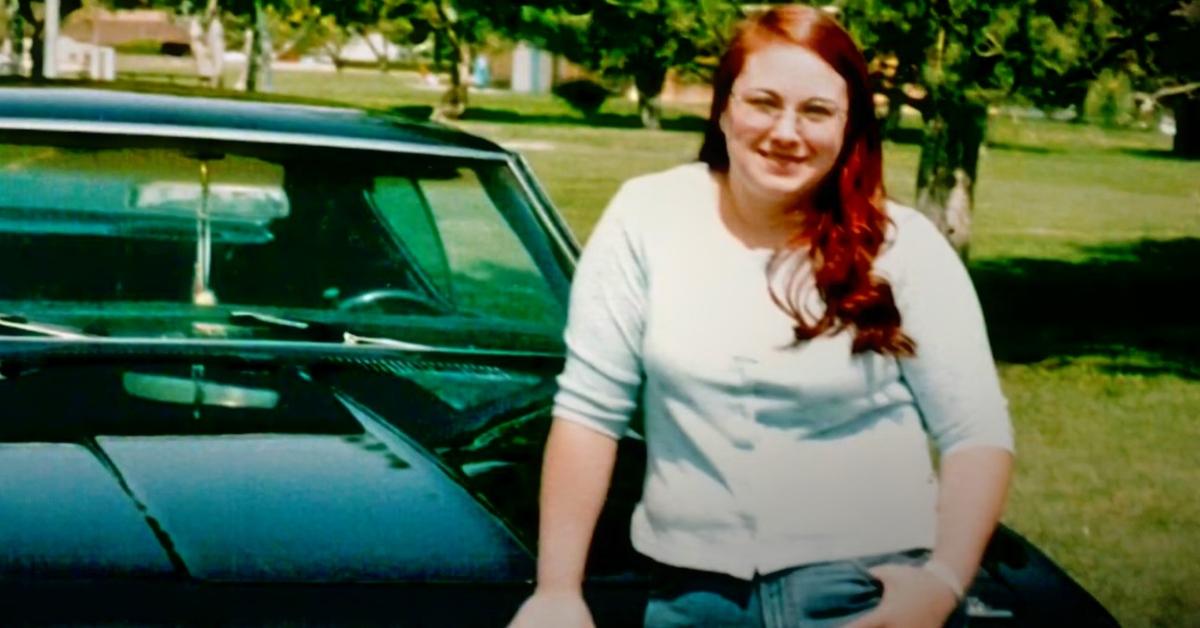 Desiree Sunford in front of a car