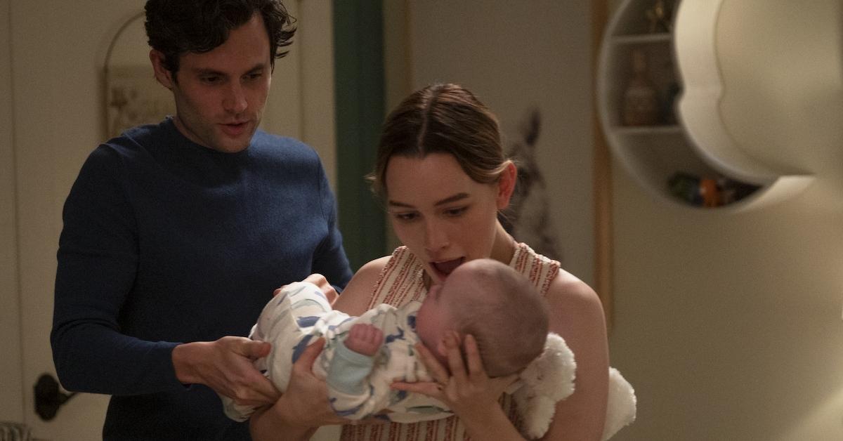 Joe and Love Quinn-Goldberg with their son in 'You' 3x01