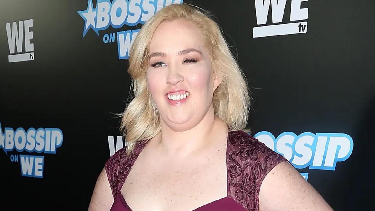 Mama June in a maroon dress at the Bossip Best Dressed List Event in 2018