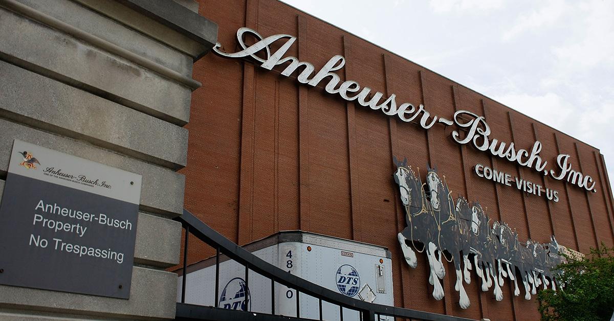 The Anheuser-Busch on the side of a building. 