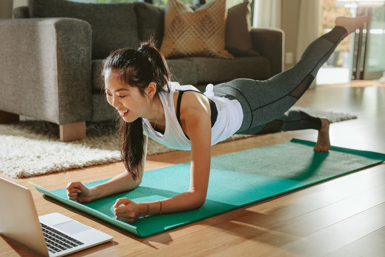 Woman Is Stretching Her Long Legs On The Fitness And Circuit Training Stock  Photo - Download Image Now - iStock