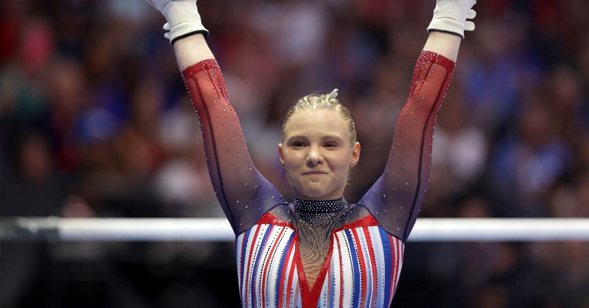 Jade Carey reacts after finishing her routine on the uneven bars on Day Four of the 2024 U.S. Olympic Team Gymnastics Trials.