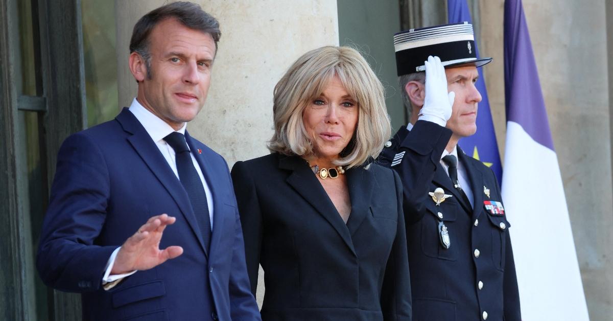 Emmanuel Macron (L) and his wife, Brigitte Macron (R)