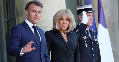 Emmanuel Macron (L) and his wife, Brigitte Macron (R)