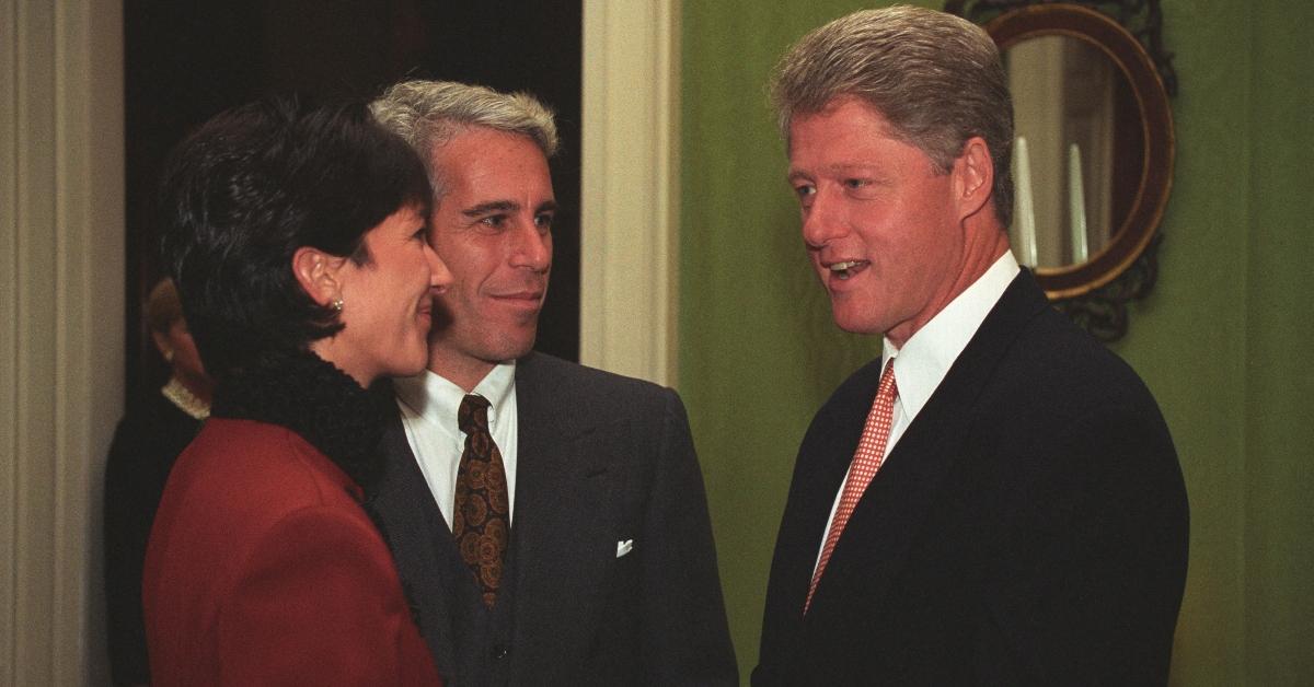 Jeffrey Epstein (C) and Ghislaine Maxwell (L) grinning with Bill Clinton during a VIP tour of the White House