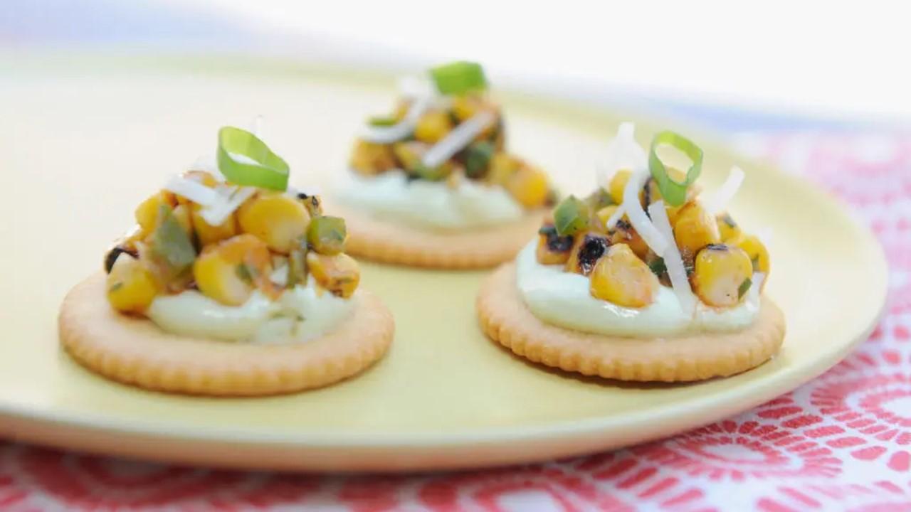 Ritz cracker appetizers on a yellow plate