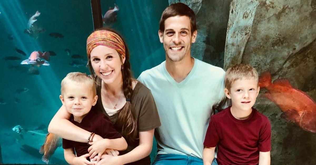 Jill Duggar and Derick Dillard and two of their kids at an aquarium