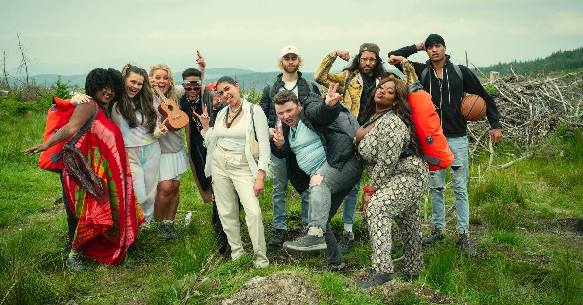 The 'Snowflake Mountain' Season 1 cast posing outside during filming.