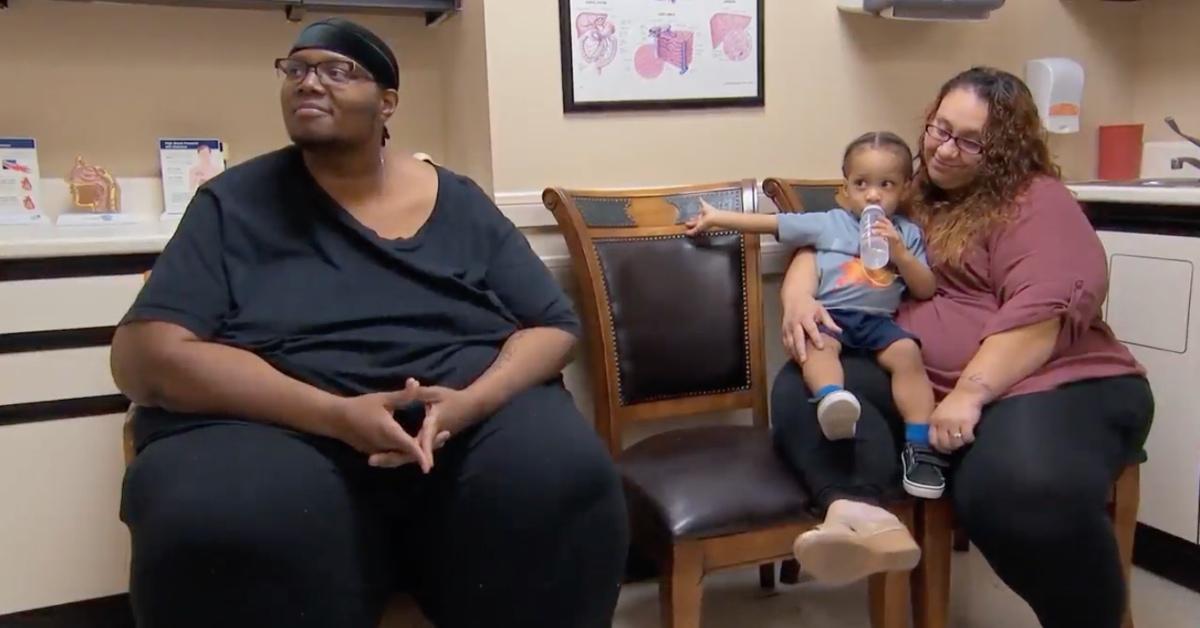 Julian, his wife, and their adopted son at Dr. Now's office.