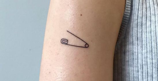 Symbolic meaning of on sale a safety pin