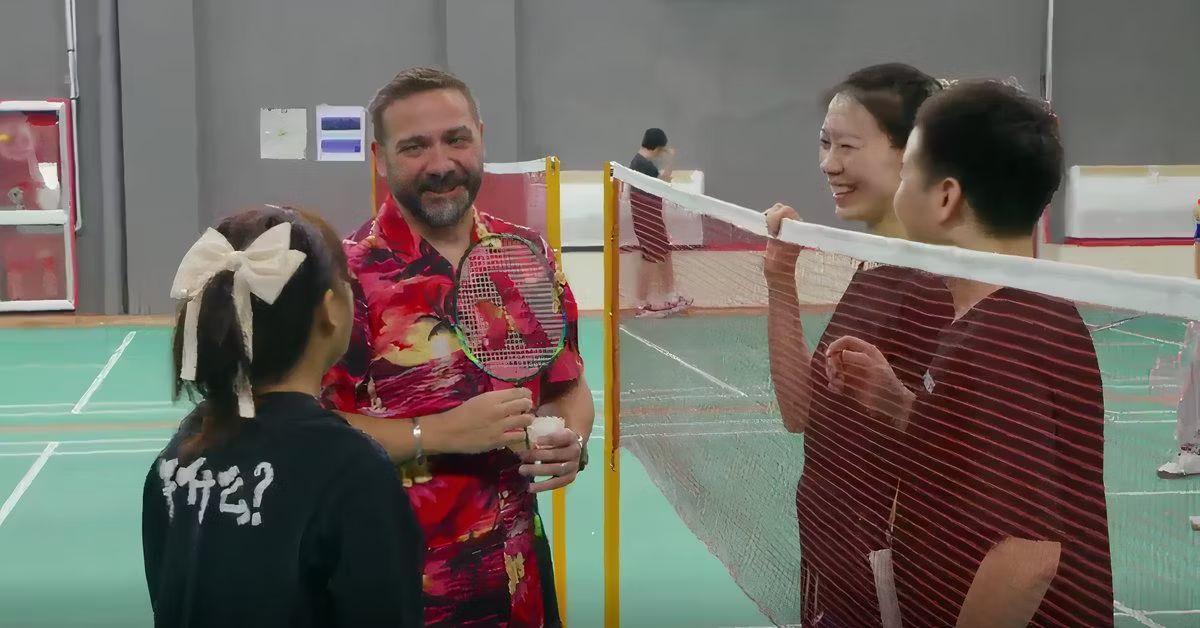 Josh and Lily (with her back to the camera) chat with her badminton friends over the net on '90 Day Fiancé: The Other Way'